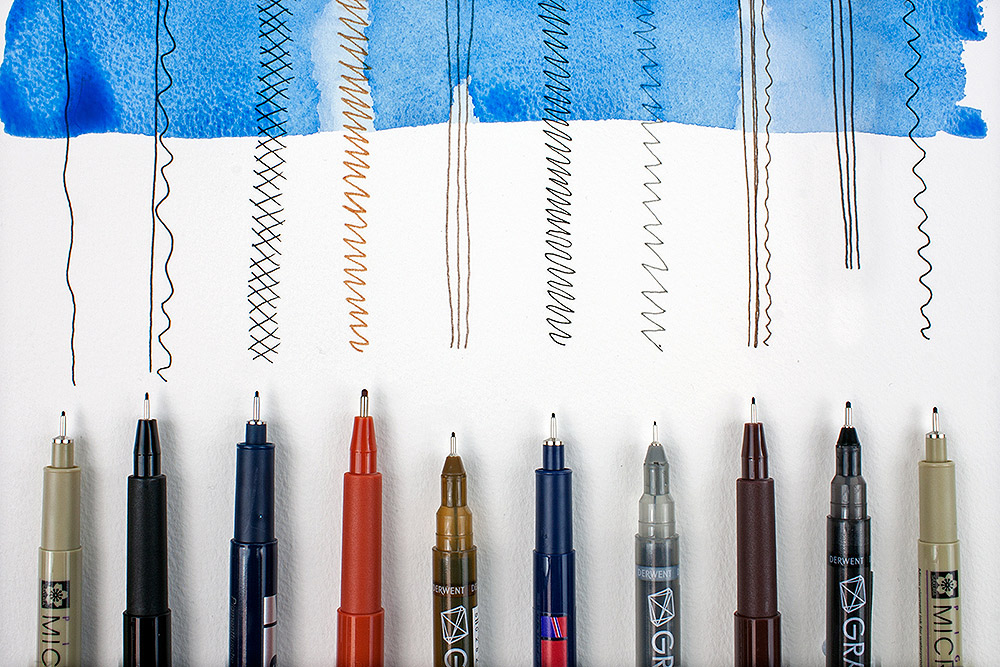 Selection of artists' fine liner pens  with watercolour wash.
