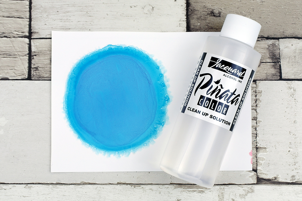 Piñata Alcohol Ink Baja Blue diluted with Piñata Alcohol Ink Clean Up Solution