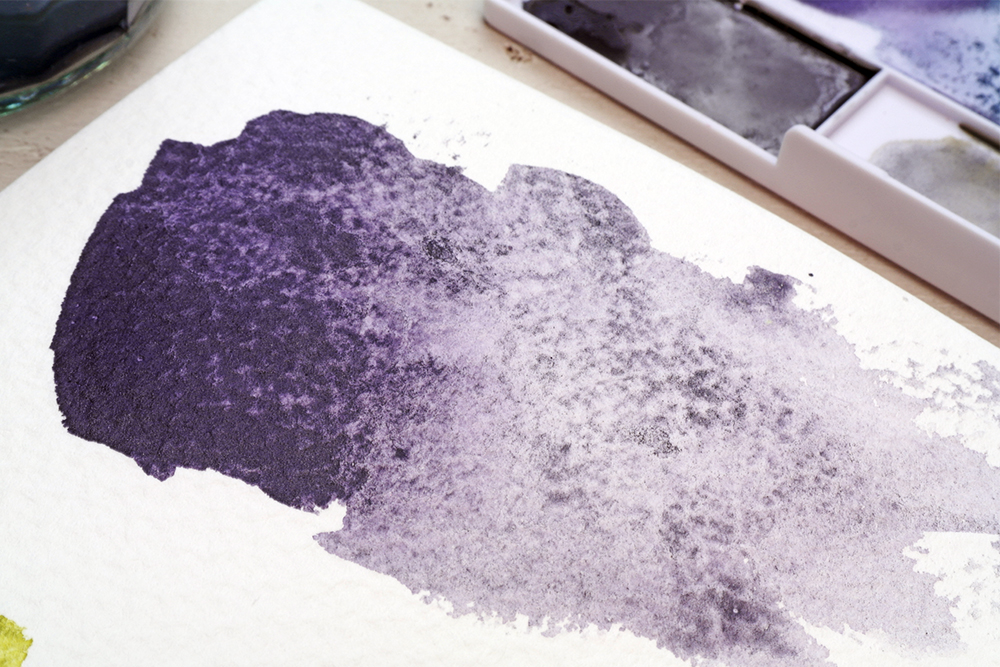 Derwent Graphitint Aubergine Paint Pan Swatch on Rough Watercolour Paper