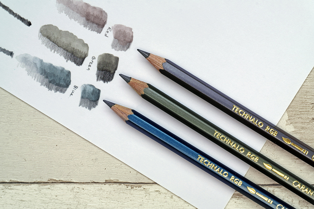 The full range of Caran d'Ache Technalo RGB Water Soluble Graphite drawing and sketching pencils with swatches