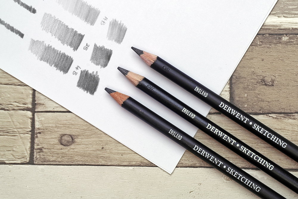 The full range of Derwent Sketching Graphite drawing pencils with swatches