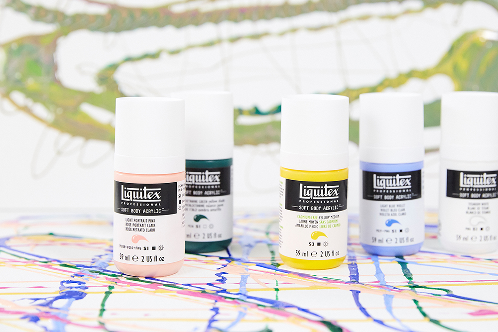 A selection of Liquitex Professional Soft Body Acrylics used with acrylic pour paintings