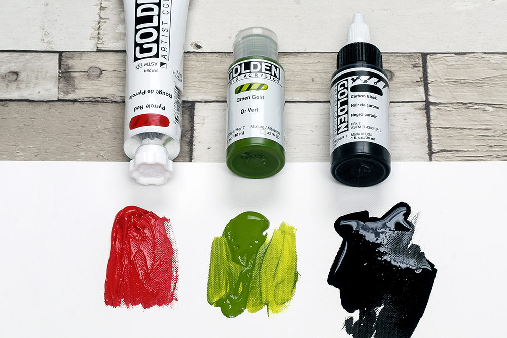 Golden Heavy Body Pyrrole Red,Fluid Green Gold and High Flow Carbon Black on Tela paper sheet