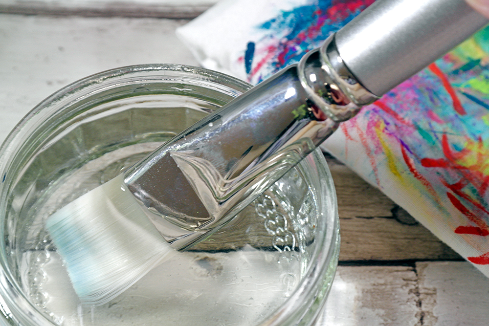 Step 5 Large flat acrylic brush having its final rinse in cold water