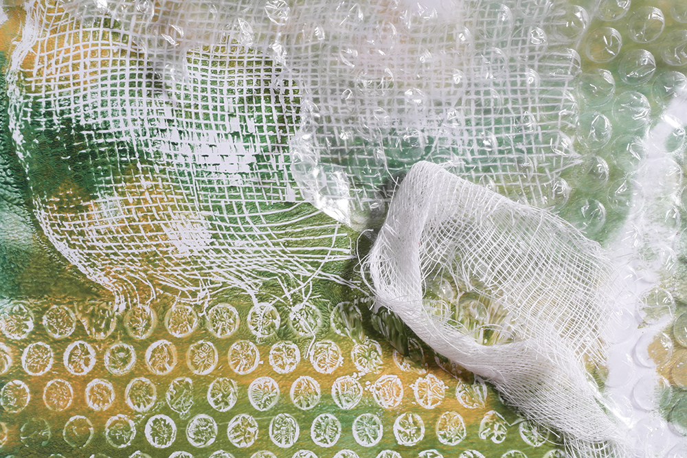 Gel Printing using bubble wrap, gauze and fabric - materials with print