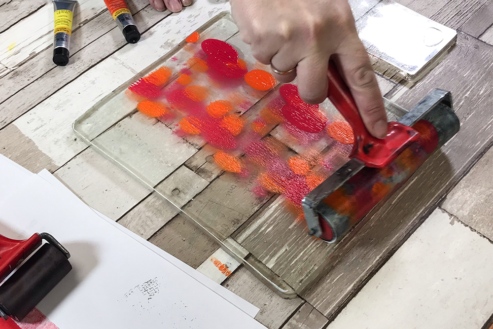 Monoprinting with a Gel Press Gel Printing Plate - Step One: Using a brayer to ink up the plate.
