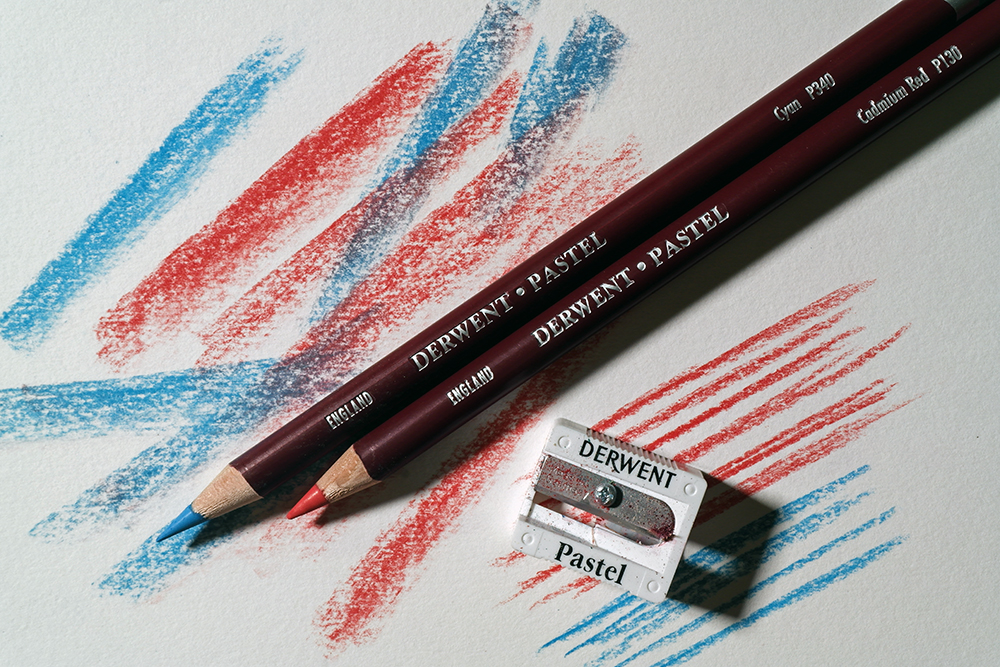 Use all sides of the Pastel Pencil - Derwent Pastel Pencils in Blue and Red have been used to create varying weights of pastel marks.