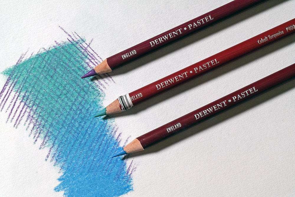 Harmonise your colour scheme with hatching - A purple Derwent Pastel Pencil has been used to create cross hatching across a smooth gradient of blue and turquoise pastel pencil.
