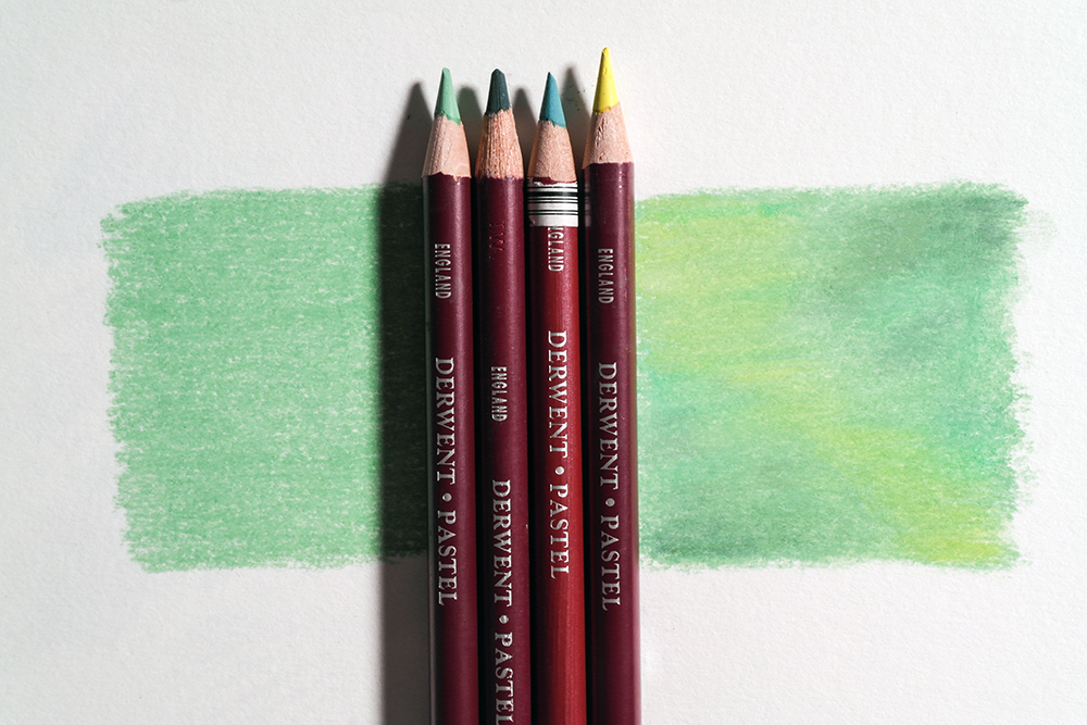 Layer up similar colours to create richness - Derwent Pastel Pencils in Greens, Turquoise and Yellow have been used to create rich areas of colour.