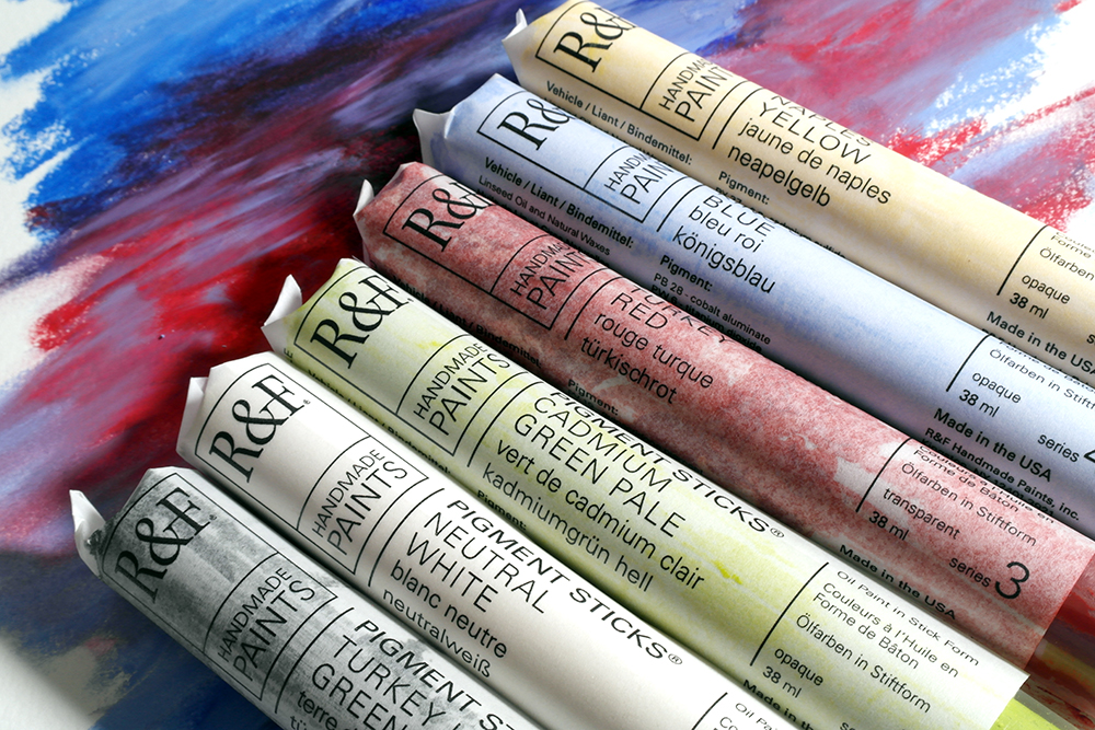 R&F Handmade Paints Oil Pigment Sticks assorted colours on an oil painted background