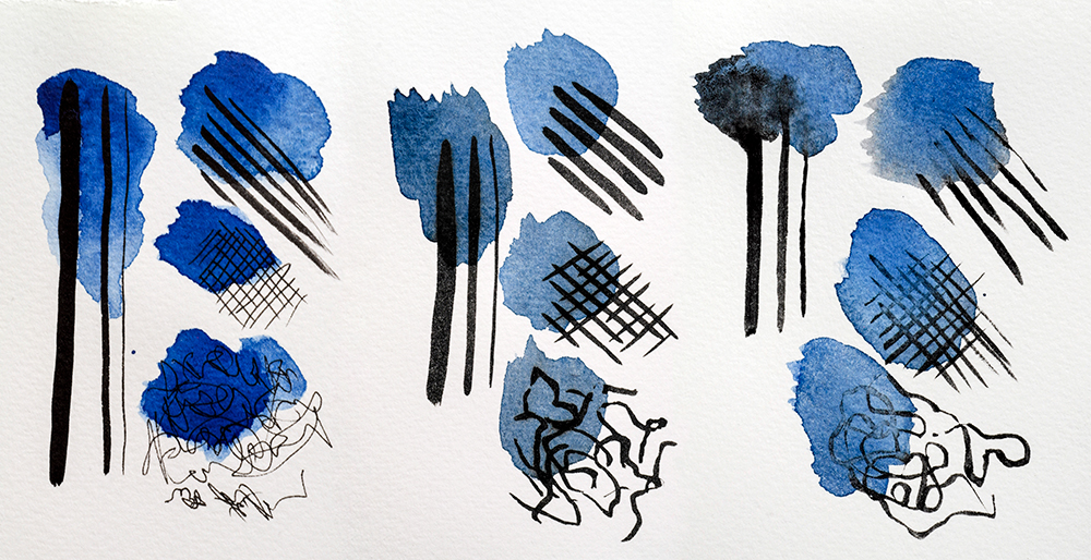 Waterproof, water resistant and water soluble pen and inks tested with a blue watercolour wash.