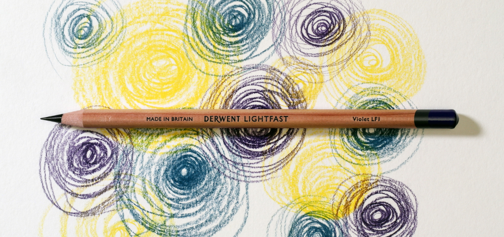 Derwent Lightfast Oil Based Coloured Pencil on a colourful background