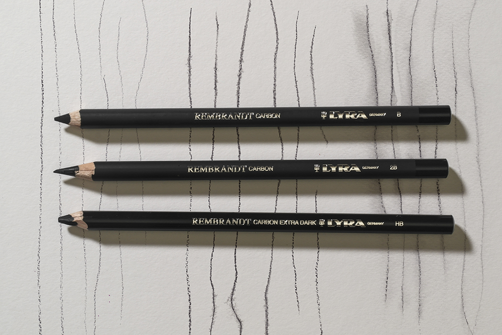Carbon pencils used dry (left) on water misted paper (centre) and with water brushed over (right).