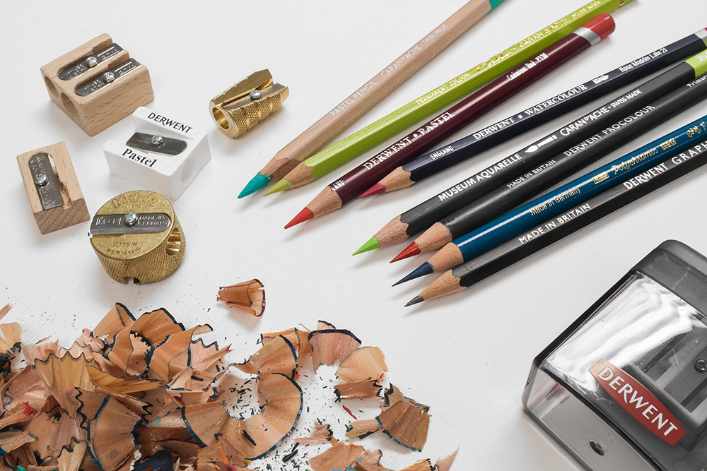 Assorted artists pencils and pencil sharpeners