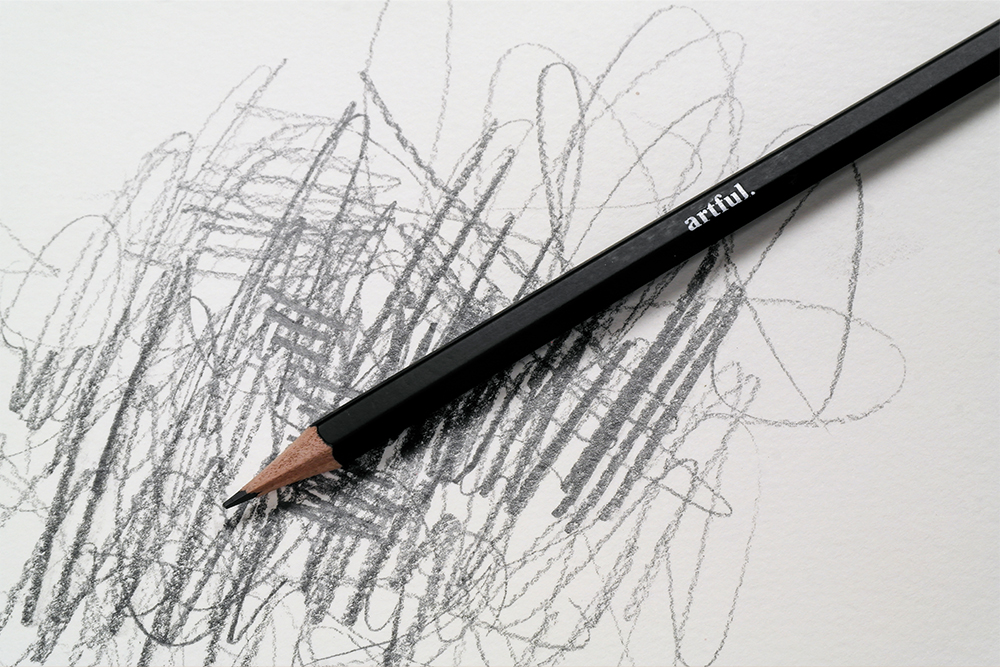 Artful F Grade Graphite Pencil on scribbled background