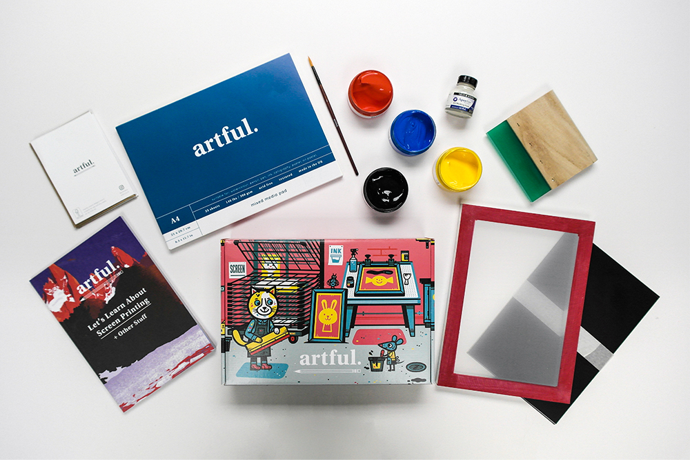 Flatlay of contents from the Artful Let's Learn Screen Printing Box
