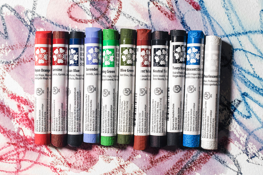 11 new Daniel Smith Watercolour Stick colours on a painted background