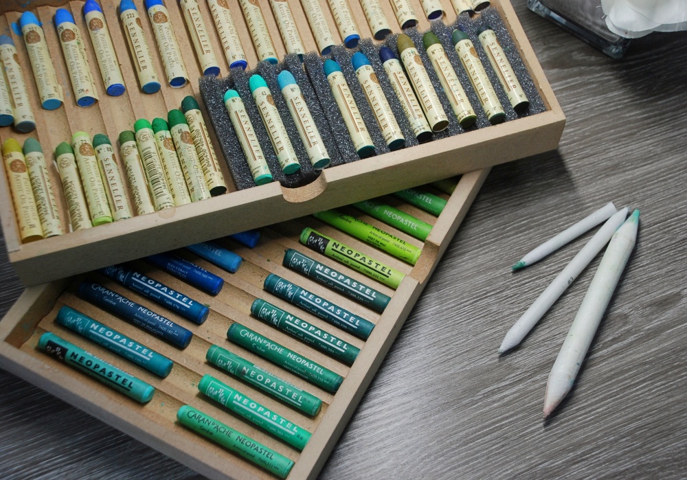 Image of oil pastels in a storage box