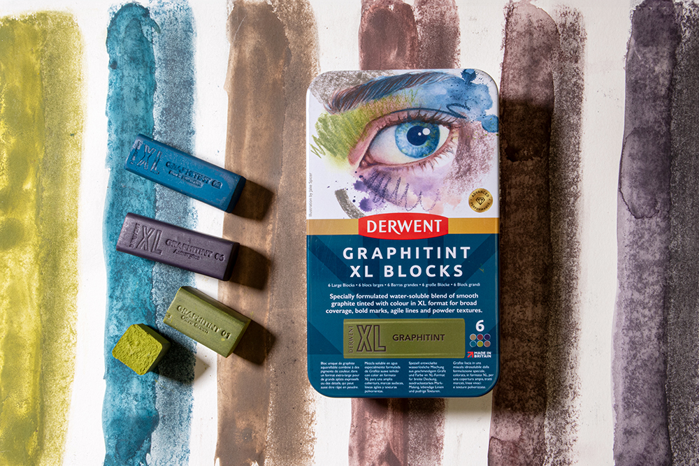 Derwent Graphitint XL Blocks on a painted background